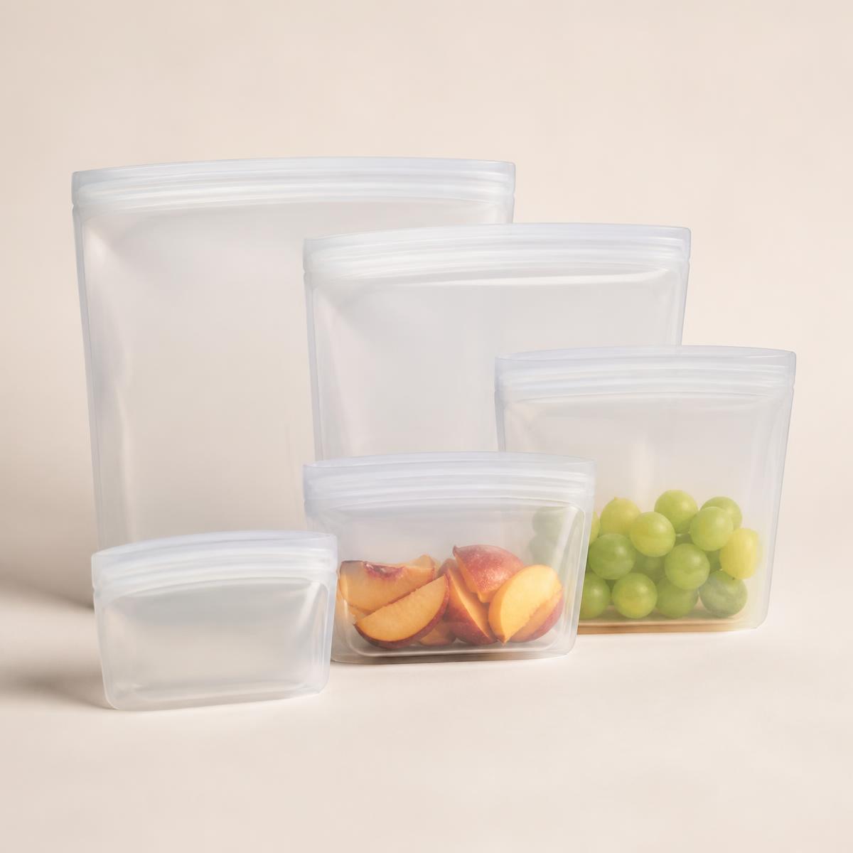 Reusable food storage bags in several sizes standing upright